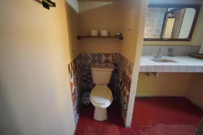 Un baño de Habitacion Faro