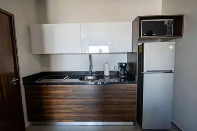 Una cocina o zona de cocina en Manzara 153 hermoso departamento