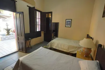 Cama o camas de una habitación en Casa Feliz Playa Norte