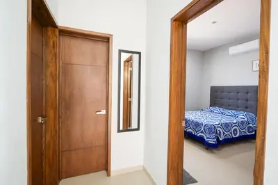 Cama o camas de una habitación en Mojarra 1 Hermoso y amplio depa