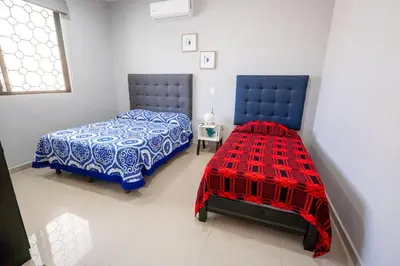 Cama o camas de una habitación en Mojarra 1 Hermoso y amplio depa