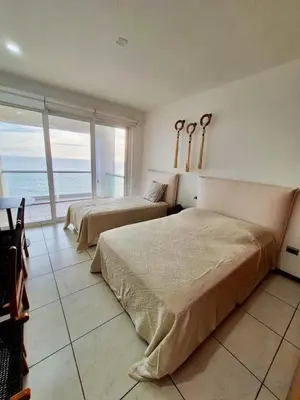 Cama o camas de una habitación en Horizon Azul Pacifico Lujo frente Playa y Malecón
