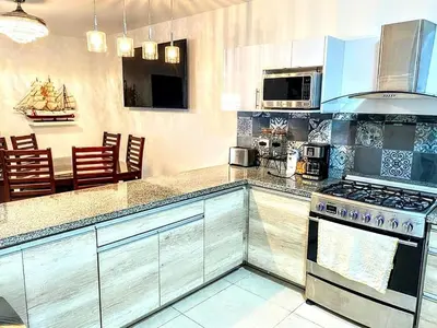 Una cocina o zona de cocina en Casa azul Marino