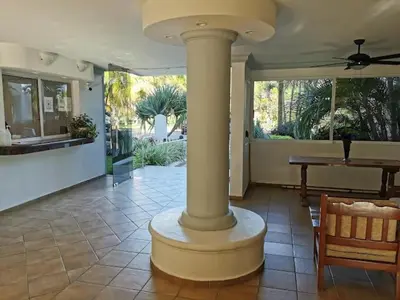 Un balcón o terraza de Exclusive Oceanfront Apartment on the Beach