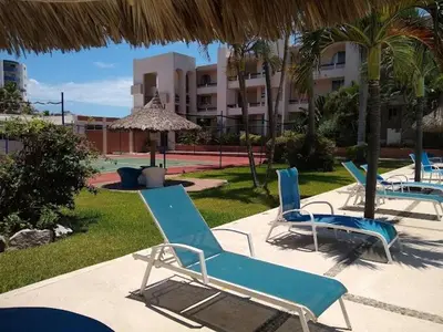 Piscina en o cerca de Exclusive Oceanfront Apartment on the Beach