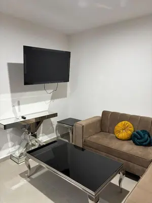 Una televisión o centro de entretenimiento en Casa privada Cibeles