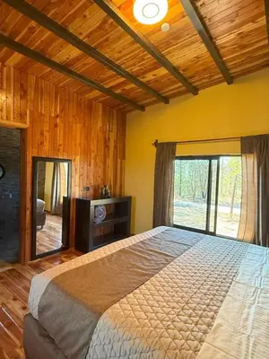 Cama o camas de una habitación en Lujo Rustico Lago Cerca Terraza Mascotas