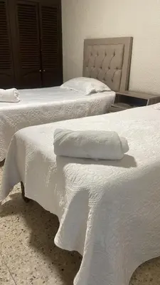 Cama o camas de una habitación en Casa 49i Condominio cerca del aeropuerto y consulado