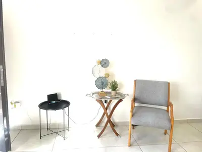 Zona de estar de Casa 49i Condominio cerca del aeropuerto y consulado