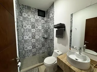 Un baño de Ferrara