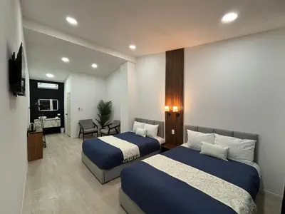 Cama o camas de una habitación en Borunda Suites