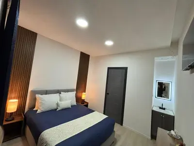 Cama o camas de una habitación en Borunda Suites