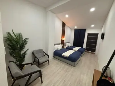 Cama o camas de una habitación en Borunda Suites