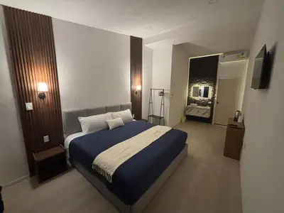Cama o camas de una habitación en Borunda Suites