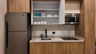 Una cocina o zona de cocina en Beach Loft Style and Beach Heated Pool