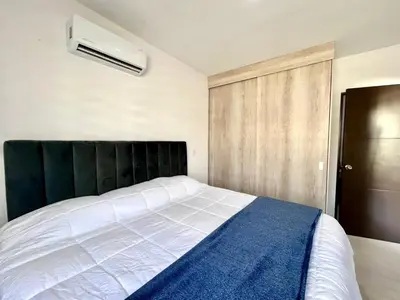 Cama o camas de una habitación en Apartment in Oceanna Condos del Mar Cerritos