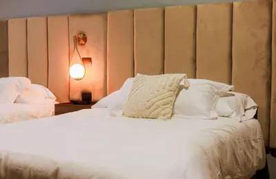 Cama o camas de una habitación en San Patricio Hotel Studio
