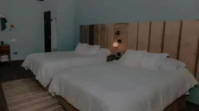 Cama o camas de una habitación en San Patricio Hotel Studio