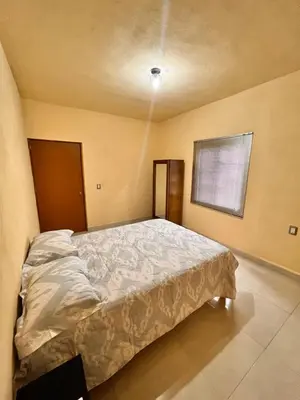 Cama o camas de una habitación en Depa Familiar