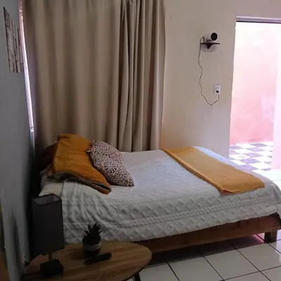 Cama o camas de una habitación en House with 3 bedrooms, projector, work area and barbecue