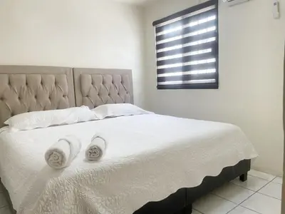 Cama o camas de una habitación en Casa 14 Casa céntrica de 2 recamaras en el corazón del Blvd Morelos
