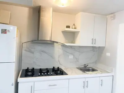 Una cocina o zona de cocina en Casa 14 Casa céntrica de 2 recamaras en el corazón del Blvd Morelos