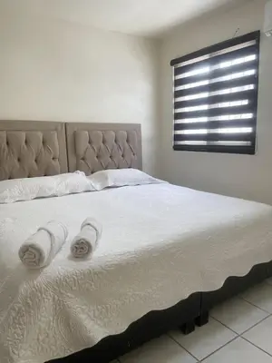 Cama o camas de una habitación en Casa 14 Casa céntrica de 2 recamaras en el corazón del Blvd Morelos