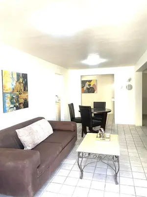 Zona de estar de Casa 11 Centrica 3 camas queen