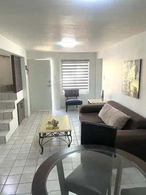 Zona de estar de Casa 11 Centrica 3 camas queen