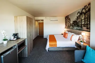 Cama o camas de una habitación en Mision Express Durango