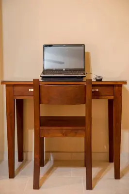 Una televisión o centro de entretenimiento en Bugambilias Suites