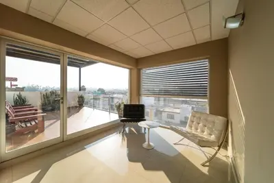 Zona de estar de Hotel Nuve Torreón