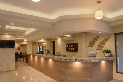 Una televisión o centro de entretenimiento en Hotel San Ignacio Inn