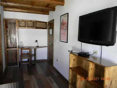 Una televisión o centro de entretenimiento en La Troje de Adobe