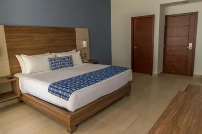 Cama o camas de una habitación en Ocean View Beach Hotel