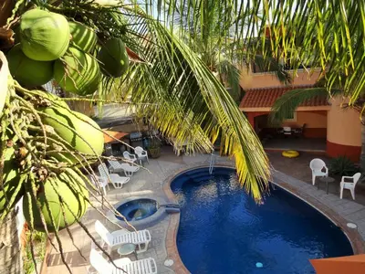 Piscina en o cerca de Coco Cabañas and Casitas Vacation Rentals