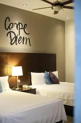 Cama o camas de una habitación en Punto Madero Hotel & Plaza