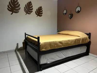 Cama o camas de una habitación en Departamento Zona Dorada