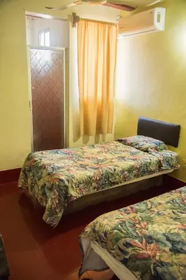 Cama o camas de una habitación en Hotel Esperanza