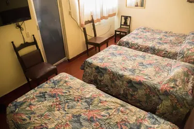 Cama o camas de una habitación en Hotel Esperanza