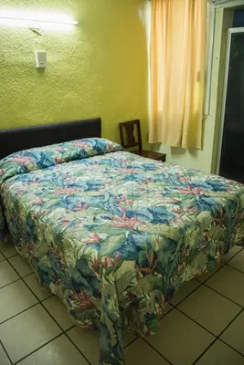 Cama o camas de una habitación en Hotel Esperanza