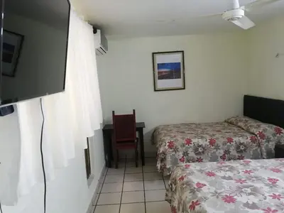 Cama o camas de una habitación en Hotel Esperanza