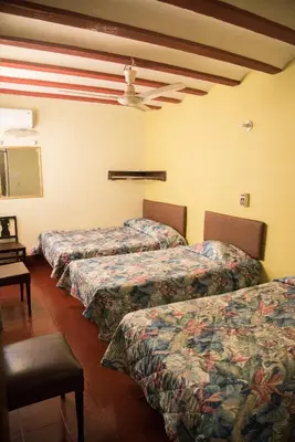 Cama o camas de una habitación en Hotel Esperanza