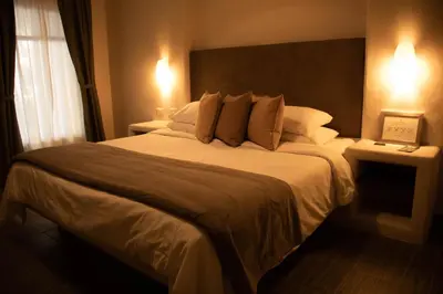 Cama o camas de una habitación en Hacienda 1800