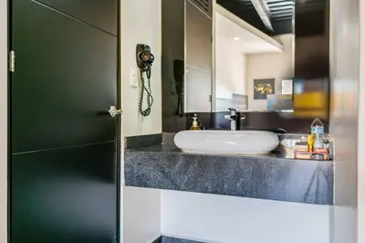 Una cocina o zona de cocina en Homesuites Malecon