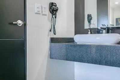 Un baño de Homesuites Malecon
