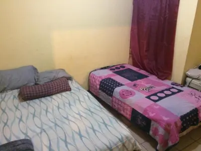 Cama o camas de una habitación en Blanquita Apartment