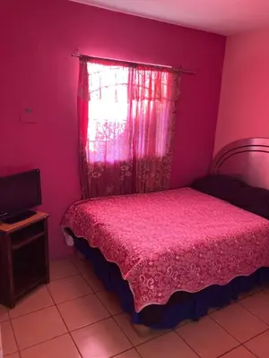 Cama o camas de una habitación en Blanquita Apartment
