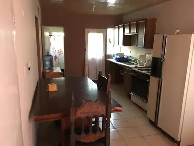 Una cocina o zona de cocina en Blanquita Apartment