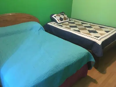 Cama o camas de una habitación en Blanquita guesthouse